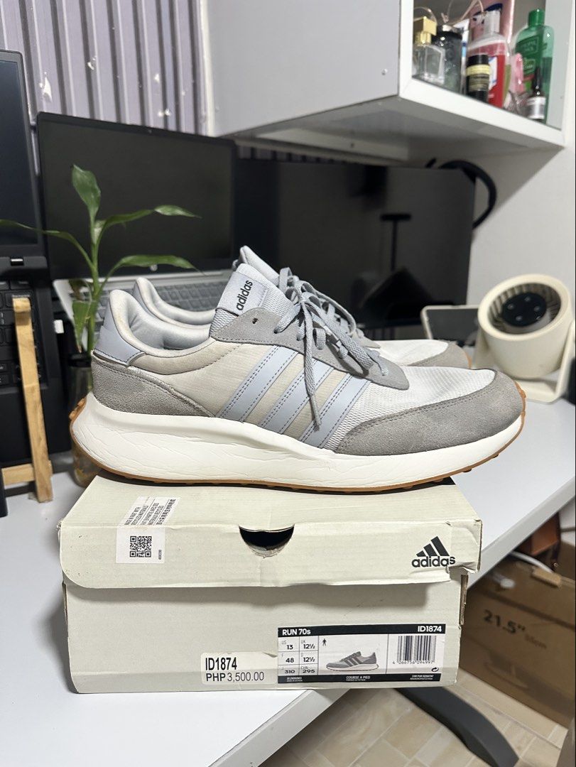 Addida RUN70 running shoes (Category: Casual Shoes) located in Manila. Submitted by businessrs39748 (Listing ID 1463719228, Image 1). Description: 👟 PRE-LOVED ADIDAS RUN 70s 👟 Decluttering and letting go of my Adidas Run 70s! ❤️ 📌 Size: US 13 / UK 12.5 / EU 48 📌 Color: Grey/White 📌 Code: ID1874 📌 Original price: ₱3,500 📌 Condition: Pre-loved, still in good condition 📌 Selling for: ₱1650 Perfect for casual wear, walking, or everyday use. P