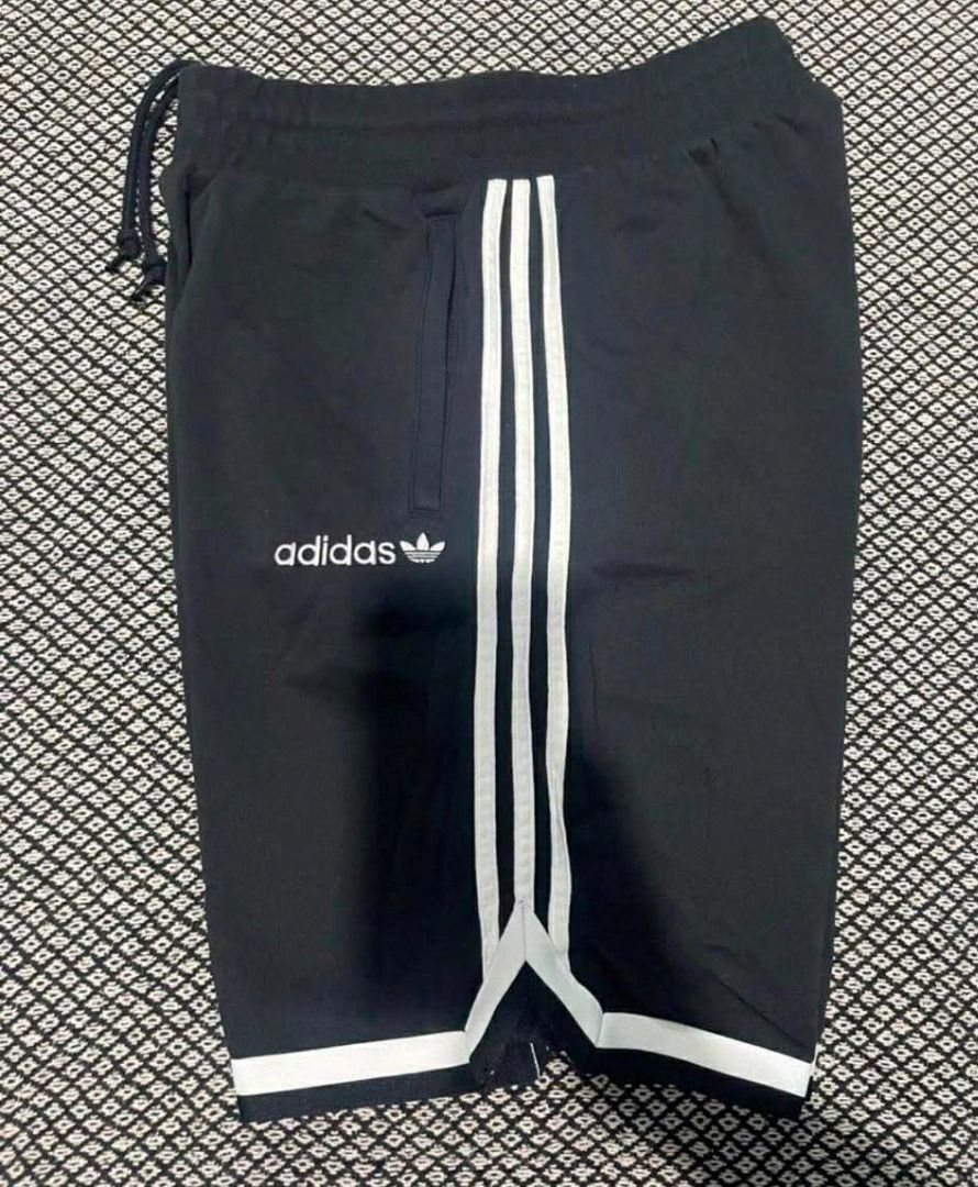 Adidas Black Shorts with White Stripes (Category: Activewear) located in Cainta. Submitted by patrickwilsonstore (Listing ID 1463610339, Image 1). Description: Adidas pre-game jogger shorts (cotton) Size: medium Length- 21 inches Color: black *used once Selling price: 799 neg SRP:2500.