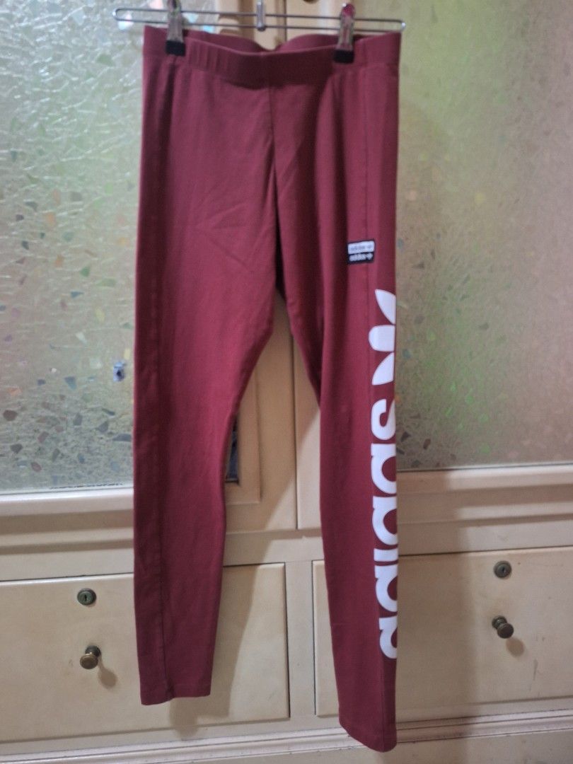 Adidas Burgundy Leggings (Category: Activewear) located in Mabalacat. Submitted by jhaycore05 (Listing ID 1463687198, Image 1). Description: Legit adidas Women's High-Rise 3-Stripes Tights / Leggings in the highly sought-after "Mystery Red" colorway (Style Code: FH7557). Super beautiful deep burgundy/maroon shade with crisp white side stripes. High-waisted construction provides total midsection support—perfect for gym classes, running, yoga, or e
