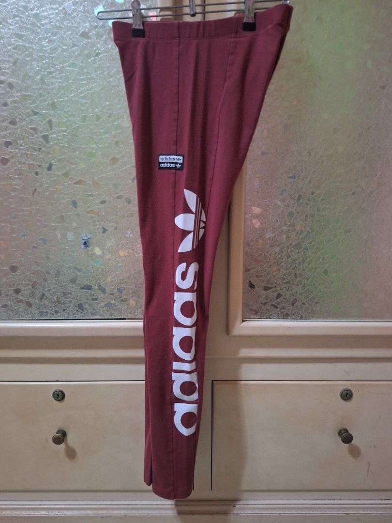 Adidas Burgundy Leggings (Category: Activewear) located in Mabalacat. Submitted by jhaycore05 (Listing ID 1463687198, Image 2). Description: Legit adidas Women's High-Rise 3-Stripes Tights / Leggings in the highly sought-after "Mystery Red" colorway (Style Code: FH7557). Super beautiful deep burgundy/maroon shade with crisp white side stripes. High-waisted construction provides total midsection support—perfect for gym classes, running, yoga, or e