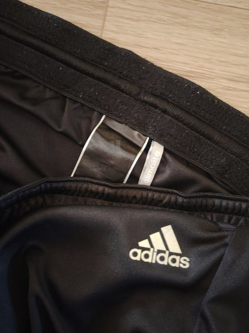 Adidas Climalite Black Athletic Shorts (M-L) (Category: Shorts) located in Nasipit. Submitted by edwingonzales498-69377 (Listing ID 1463560901, Image 2). Description: - Black Adidas shorts - Climalite material for breathability - Elastic waistband with drawstring - Ideal for sports or casual wear - Size: 28-34 inches.
