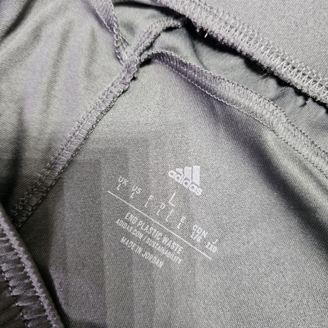 Adidas Gray Shorts (Category: Shorts) located in Baguio. Submitted by kayeonlineshop (Listing ID 1463621888, Image 2). Description: gray Adidas athletic shorts featuring classic black side stripes and the brand's logo on the lower hem w32-40 L20.5 h29.