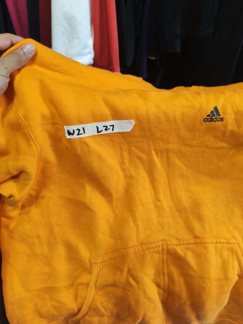 Adidas Orange Hoodie Pullover Size L (Category: Coats, Jackets and Outerwear) located in Quezon City. Submitted by drift_and_vibe_thrift (Listing ID 1463591037, Image 2). Description: - Orange Adidas hoodie - Size L - Features a cool patterned lining inside the hood - Front kangaroo pocket - Great for casual wear.