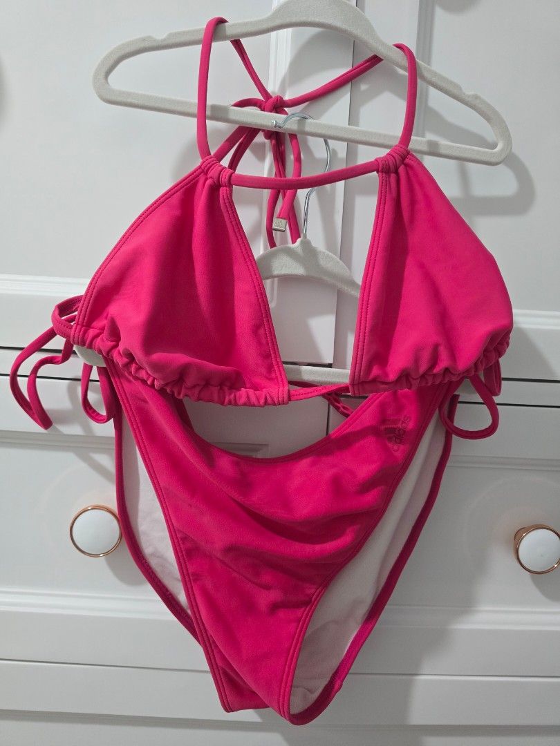 Adidas Pink Bikini Set (Category: Bikinis & Swimsuits) located in Arayat. Submitted by polenbi15 (Listing ID 1463582737, Image 1). Description: - Adorable pink Adidas bikini - Triangle top with adjustable straps - Bottoms feature convenient tie sides - Iconic Adidas logo on the top - Ideal for beach trips and pool parties - Get ready for your vacation!.