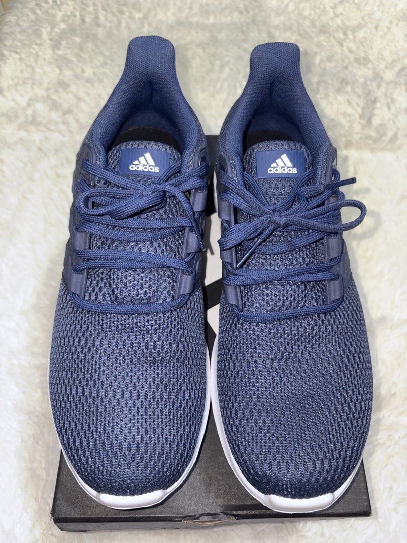 Adidas Running Shoes Navy Blue (Category: Sneakers) located in Quezon City. Submitted by Moms_closet (Listing ID 1463672768, Image 2). Description: - Navy blue Adidas running shoes - Breathable mesh upper - White sole with black accents - Lace-up closure - Ideal for workouts or casual wear - Includes original box.