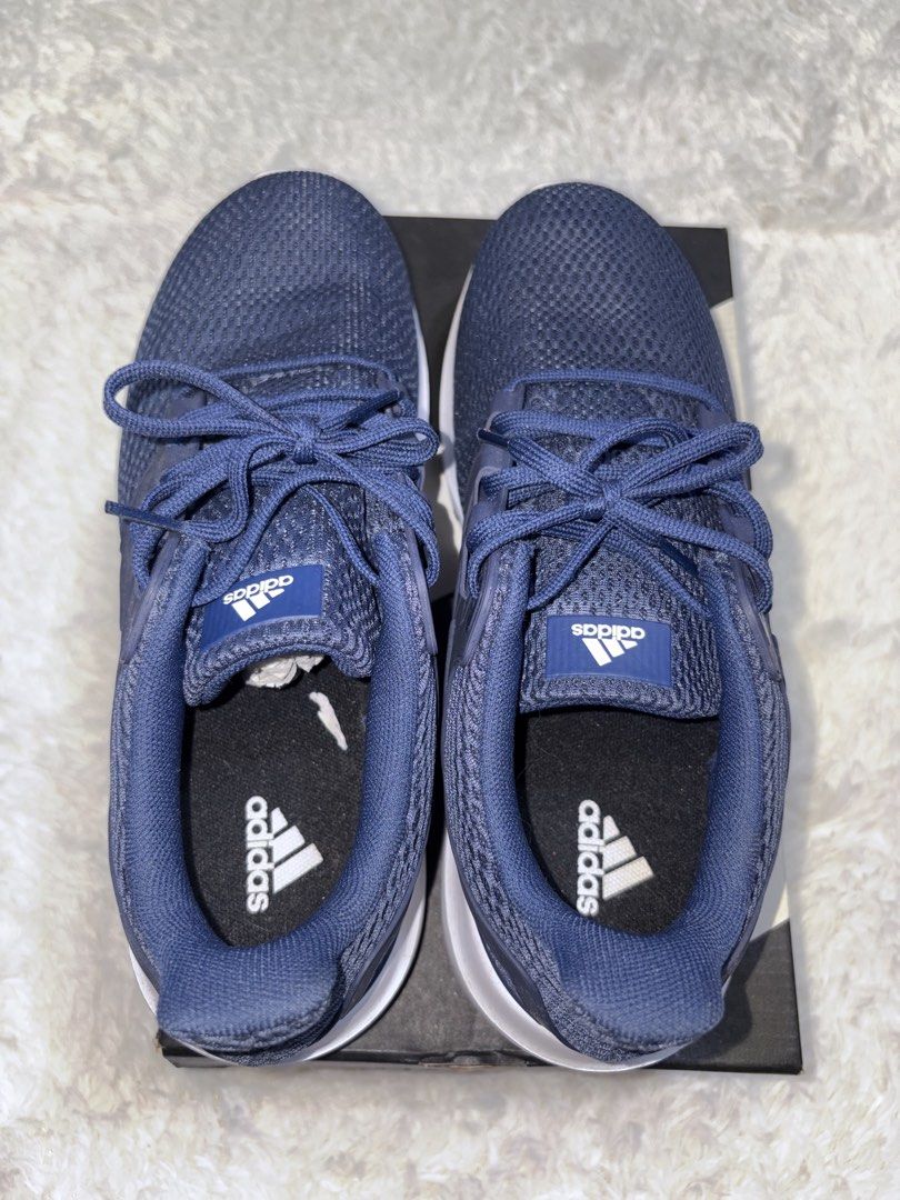 Adidas Running Shoes Navy Blue (Category: Sneakers) located in Quezon City. Submitted by Moms_closet (Listing ID 1463672768, Image 3). Description: - Navy blue Adidas running shoes - Breathable mesh upper - White sole with black accents - Lace-up closure - Ideal for workouts or casual wear - Includes original box.