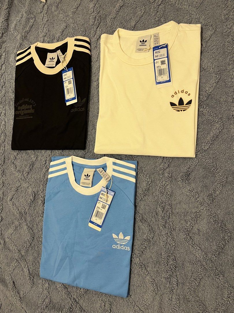 Adidas Tee (Category: Tshirts & Polo Shirts ) located in Manila. Submitted by trying2bbttr (Listing ID 1463685307, Image 2). Description: Brand new - both size Large Light blue tee avail(Large& Xlarge)- 1.5k White tee - 1.5k Black tee available (Large& Xlarge) - 1.9k Can give discount if get more than 1.