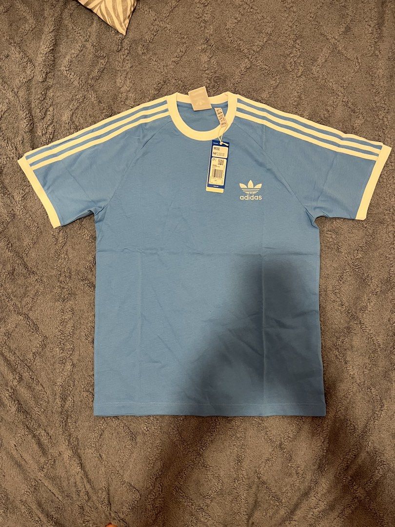 Adidas Tee (Category: Tshirts & Polo Shirts ) located in Manila. Submitted by trying2bbttr (Listing ID 1463685307, Image 3). Description: Brand new - both size Large Light blue tee avail(Large& Xlarge)- 1.5k White tee - 1.5k Black tee available (Large& Xlarge) - 1.9k Can give discount if get more than 1.