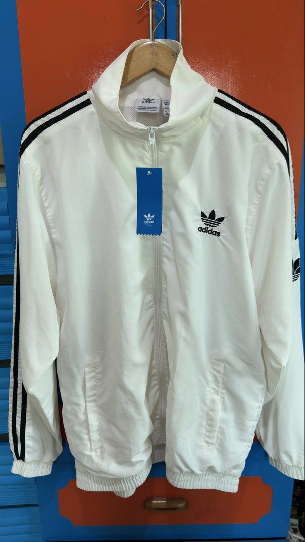 Adidas Three-Stripe Track Jacket White 2XL (Category: Coats, Jackets and Outerwear) located in Dasmarinas. Submitted by valuevibe (Listing ID 1463576029, Image 1). Description: Original Price: Php 3,500 ❌ Sale Price: Php 1,000 ✅ Brand: Adidas Size on tag: 2XL Length: 29 Width: 25 Condition: Brand New Disclaimer: Original sample photos are grabbed online and not mine, but first few photos taken are actual pictures. Shipping thru J&T or Lalamove. B