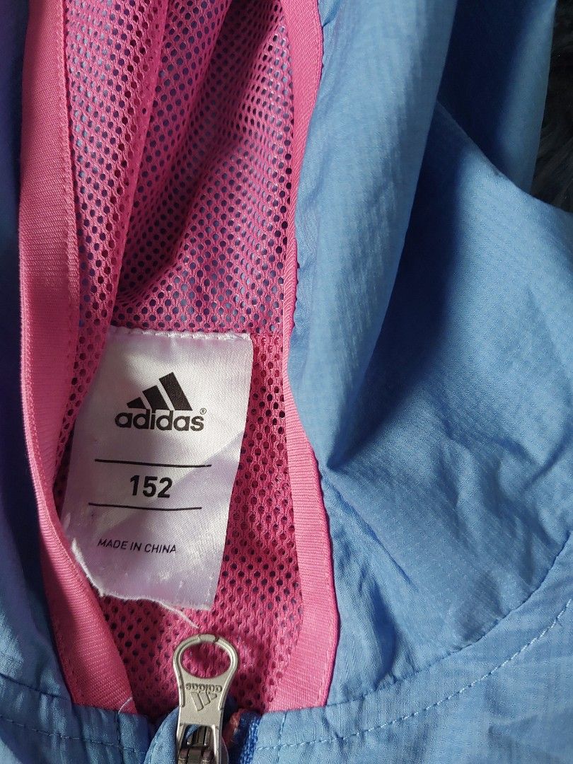 Adidas Windbreaker Jacket (Category: Coats, Jackets and Outerwear) located in Calasiao. Submitted by _annetastic_ (Listing ID 1463682840, Image 3). Description: 🔥 AUTHENTIC ADIDAS WINDBREAKER | PRELOVED | STYLISH & COMFY 🔥 🧥 Adidas windbreaker ✨ Simple, sporty, at classic na design 💨 Magaan at perfect pang-araw-araw 👟 Madaling i-match sa casual outfits 📦 Preloved pero maayos at well-kept 📏 Fits Small 💰 Sulit at abot-kayang price!.