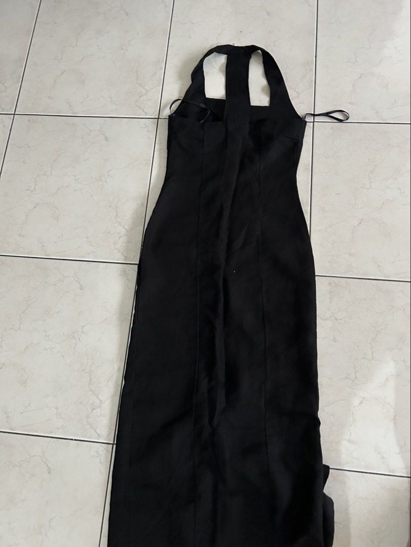 ADLIB Dresses Black Halter Neck Button Front Midi Dress (Category: Dresses) located in Cavite. Submitted by mommyannscloset (Listing ID 1463569615, Image 2). Description: - Black halter neck midi dress by ADLIB - Button-front closure with gold-toned buttons - Fitted silhouette - Subtle front hem slit - Classic piece for any occasion .