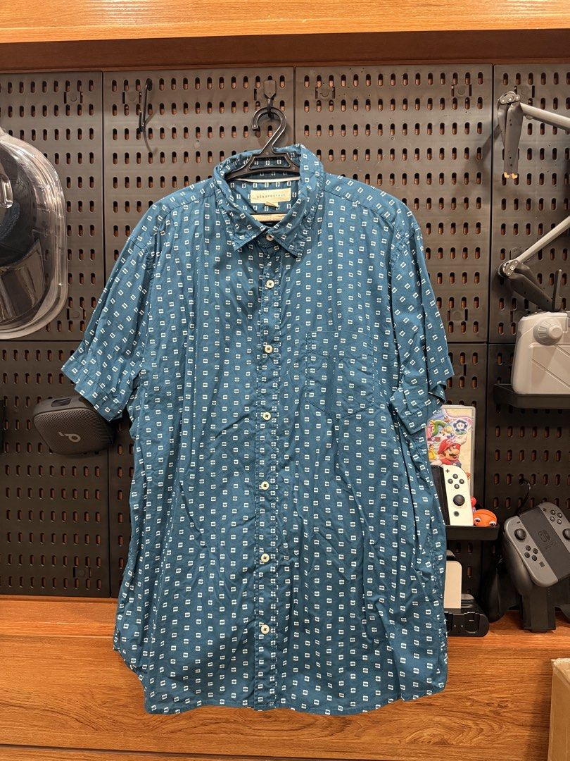 Aeropostale Blue Short Sleeve Button Up Shirt (Category: Tshirts & Polo Shirts ) located in San Fernando. Submitted by archvst.selects (Listing ID 1463669103, Image 1). Description: - Aeropostale blue short sleeve shirt - All-over small white square pattern - Button-up front with a collar - Chest pocket - Ideal for casual wear and easy styling Note: Item are personal preloved. Used once. Best fit for 168cm or 5”7.