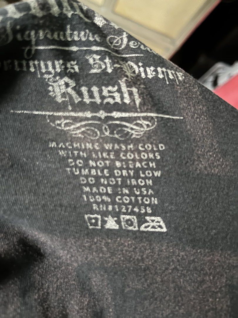 Affliction Georges St-Pierre "Rush" T-Shirt (Category: Tshirts & Polo Shirts ) located in Cebu City. Submitted by rockall24455 (Listing ID 1463741664, Image 3). Description: - Black Affliction T-Shirt - Georges St-Pierre "Rush" graphic on front and back - Size: Large 21.5x28 dimes - Material: 100% Cotton - Made in USA - Care Instructions: Machine wash cold, do not bleach, tumble dry low, do not iron - Ideal for MMA and UFC enthusiasts.