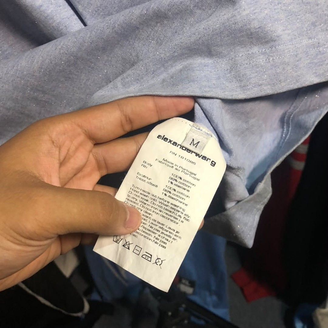 Alexander Wang Blue Glitter Shirt (Category: Shirts) located in Taguig. Submitted by soyity (Listing ID 1463671522, Image 3). Description: Size M 22W 28L Cut Neck Tag.