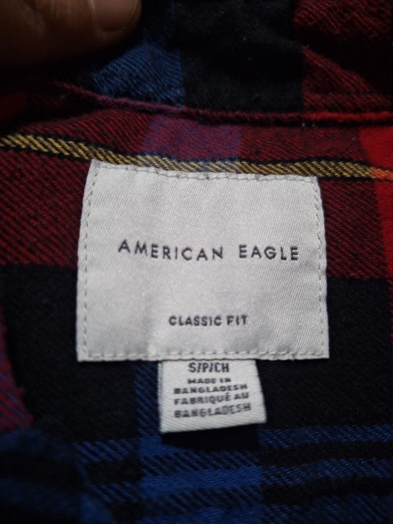American Eagle Classic Fit Plaid Flannel Shirt (Category: Tshirts & Polo Shirts ) located in Mabalacat. Submitted by jhaycore05 (Listing ID 1463688122, Image 3). Description: - Classic fit flannel shirt from American Eagle - Red, blue, and black plaid pattern - Two chest pockets with button closures - Fresh from US - Size S/P - dimes: 20x27.