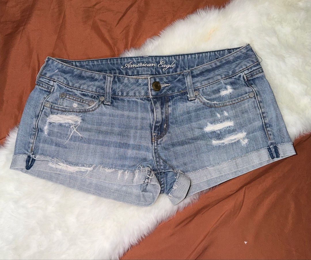 American Eagle Distressed Denim Shorts (Category: Shorts) located in Manila. Submitted by maureenn10 (Listing ID 1463575190, Image 1). Description: - Cute American Eagle denim shorts - Light wash with distressed details - Frayed hem and cuffed bottoms - Ideal for summer outfits - Versatile and easy to style with any top.