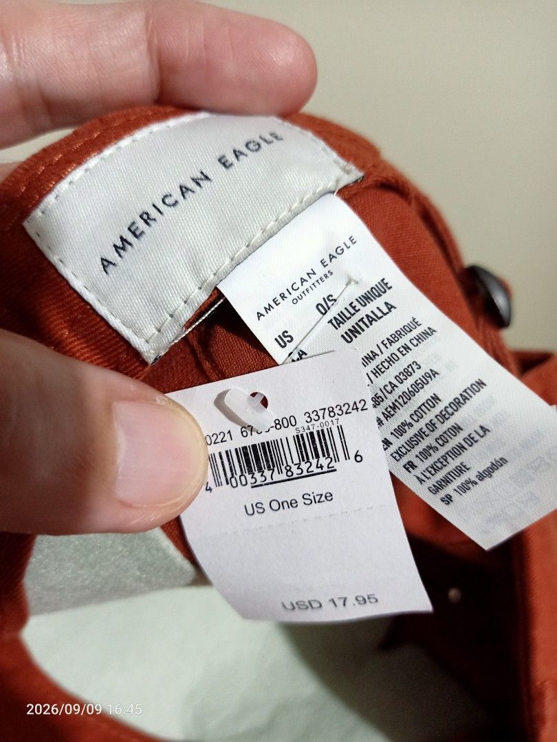 American Eagle Outfitters Cap/Hat (Category: Caps & Hats) located in Las Pinas. Submitted by OmengSoyT (Listing ID 1463653708, Image 3). Description: - Brand:Authentic American Eagle Outfitters - Color: Washed Rust orange - Design: Classic baseball cap with embroidered eagle logo on front - Material: 100% Cotton - Size: One size fits all - Style: Casual, versatile for completing any outfit - Comes with original hang and washed tags .