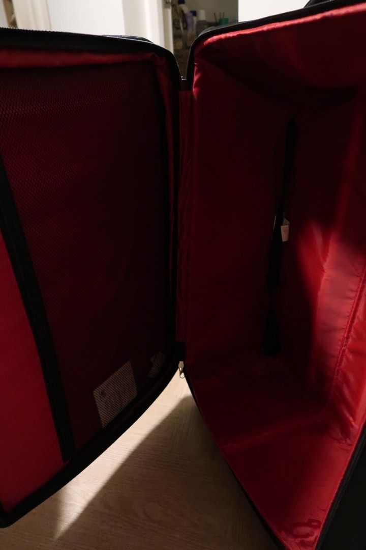 American Tourister Black Soft Shell Luggage Large (Category: Luggage) located in Pasig City. Submitted by dcvirata (Listing ID 1463680657, Image 3). Description: - Large black American Tourister suitcase - Red trim and bright red interior - Smoothly functioning zippers - Issues: wheels need replacement, lock works but it’s not smooth Dimensions: - Length 46cm - Height 78cm - Width 27cm.