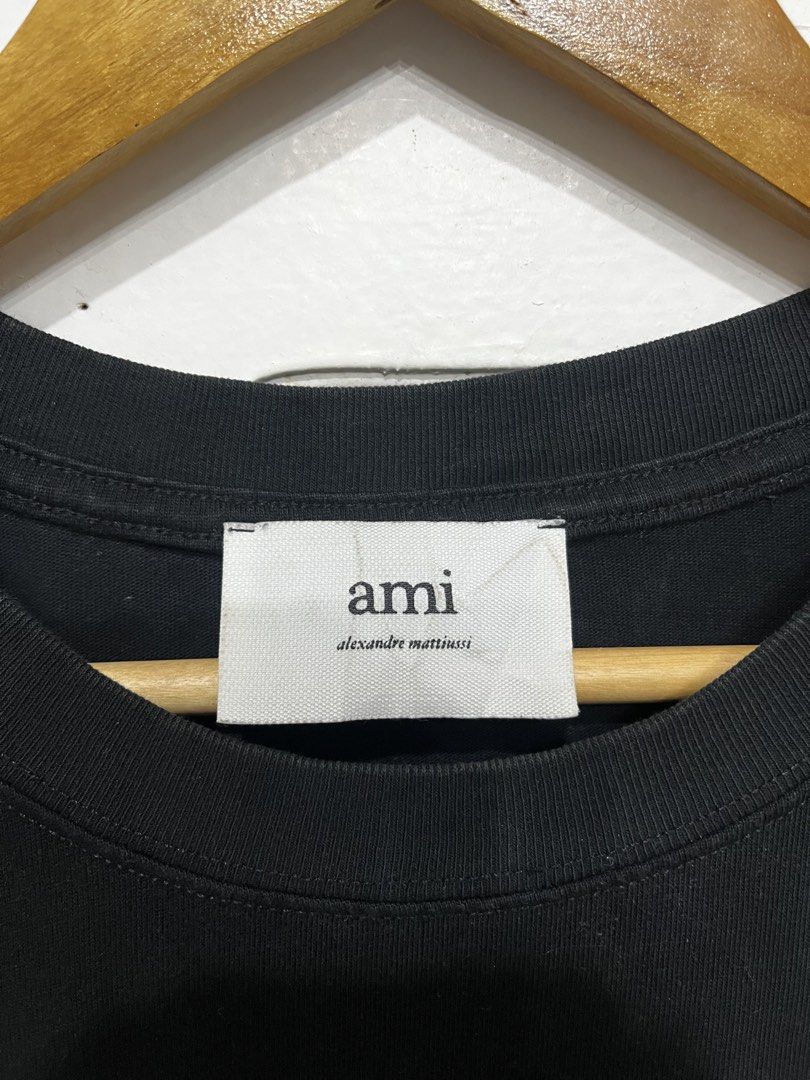 Ami Paris Chest Logo (Category: Tshirts & Polo Shirts ) located in Davao. Submitted by archived.status (Listing ID 1463681455, Image 3). Description: COLOR MAY VARY DUE TO LIGHTING‼️ Condition: 9.5/10 Color rate: 9.5/10, or better Issue: needs wash only Size Small fit Large Width 22 Length 28.