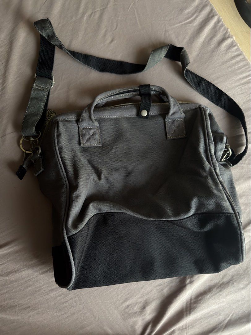 Anello 2-way Bag Grey Canvas (Category: Backpacks) located in Manila. Submitted by iamemmc (Listing ID 1463658547, Image 3). Description: - Grey Anello bag - Convertible: Shoulder bag or tote - Main compartment with zipper closure - Front zipper pocket - Interior lined with blue fabric - Includes a small interior pocket - Durable canvas material - Ideal for everyday use.