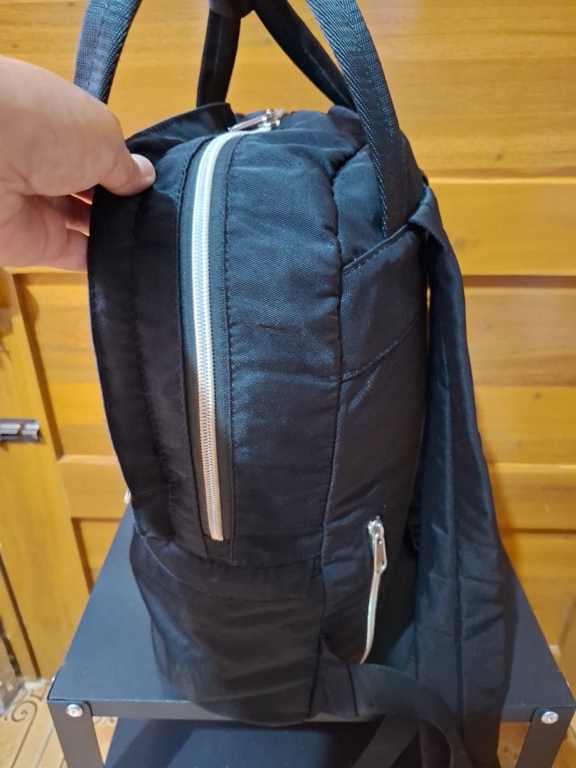 Anello Backpack Black (Category: Backpacks) located in Muntinlupa City. Submitted by googoosh_collection (Listing ID 1463578310, Image 2). Description: *Black Anello backpack with top handles and shoulder straps. Features multiple zipper compartments, including one with an inner mesh pocket. Spacious and perfect for daily use or travel. *RFS: Decluttering MOD: Lalamove (Shipping fee shouldered by the buyer) MOP: Gcash 📍Location: Muntinlupa.
