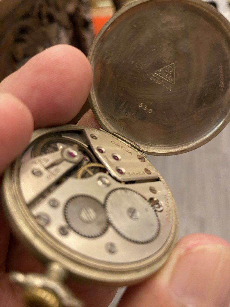ANTIQUE OMEGA POCKET WATCH (Category: Luxury Watches) located in Makati City. Submitted by celebrityauctions (Listing ID 1463593990, Image 3). Description: : No glass cover but working all original 🛠️ Technical Specifications Brand: Omega [1] Movement Serial Number: 10557656 (visible on the left main plate edge). Estimated Production Year: Circa 1944–1945. According to historical Omega Serial Number Charts, the 10 million block corresponds to pr