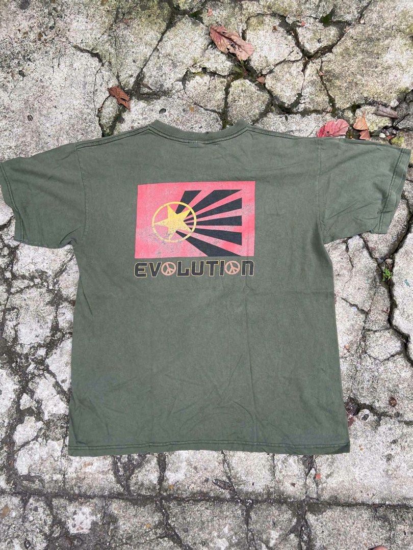 Anvil John Lennon Evolution 2000 (Category: Tshirts & Polo Shirts ) located in Manila. Submitted by clementdav22513 (Listing ID 1463664233, Image 2). Description: - Olive green t-shirt with John Lennon graphic print - 'EVOLUTION' text on front and back - Made from 100% pre-shrunk cotton - Size: Large.