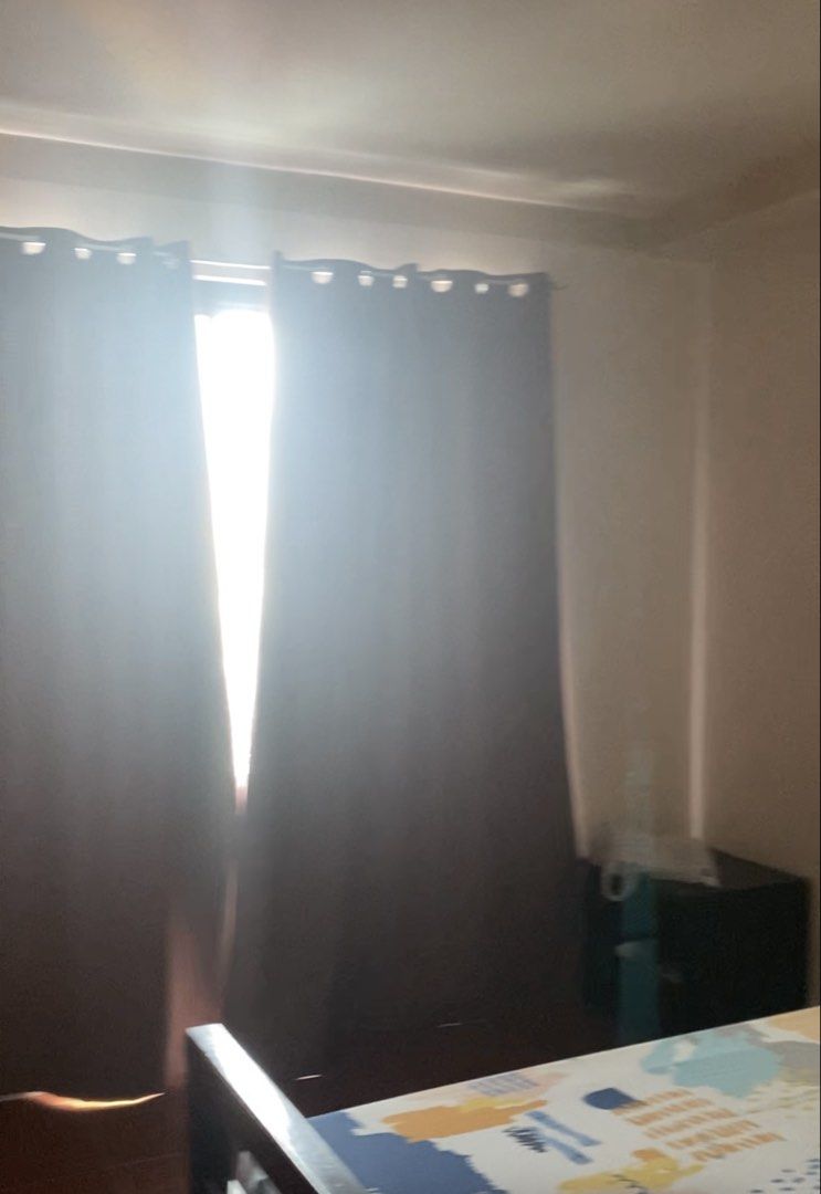 Apartment for Rent with City View (Category: Apartments & Condos) located in Pasay City. Submitted by braveforest_b47a7e (Listing ID 1463700963, Image 2). Description: - Cozy condo with a great city view - Perfect for singles or couples - Includes refrigerator, bed ,cabinet - Comes with curtains and an air conditioning unit - Balcony offers a nice outlook - Located in a bustling urban area, close to amenities.