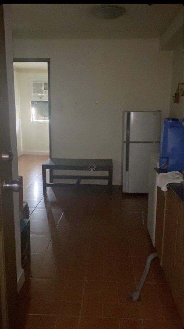 Apartment for Rent with City View (Category: Apartments & Condos) located in Pasay City. Submitted by braveforest_b47a7e (Listing ID 1463700963, Image 1). Description: - Cozy condo with a great city view - Perfect for singles or couples - Includes refrigerator, bed ,cabinet - Comes with curtains and an air conditioning unit - Balcony offers a nice outlook - Located in a bustling urban area, close to amenities.