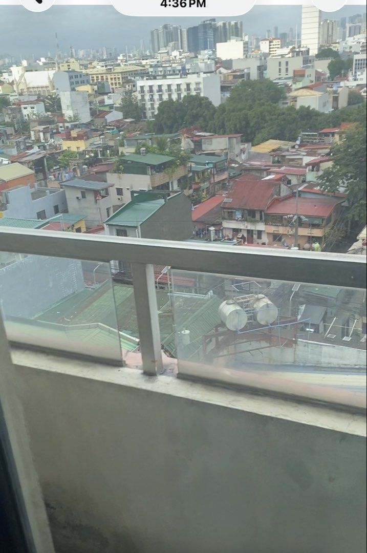 Apartment for Rent with City View (Category: Apartments & Condos) located in Pasay City. Submitted by braveforest_b47a7e (Listing ID 1463700963, Image 3). Description: - Cozy condo with a great city view - Perfect for singles or couples - Includes refrigerator, bed ,cabinet - Comes with curtains and an air conditioning unit - Balcony offers a nice outlook - Located in a bustling urban area, close to amenities.