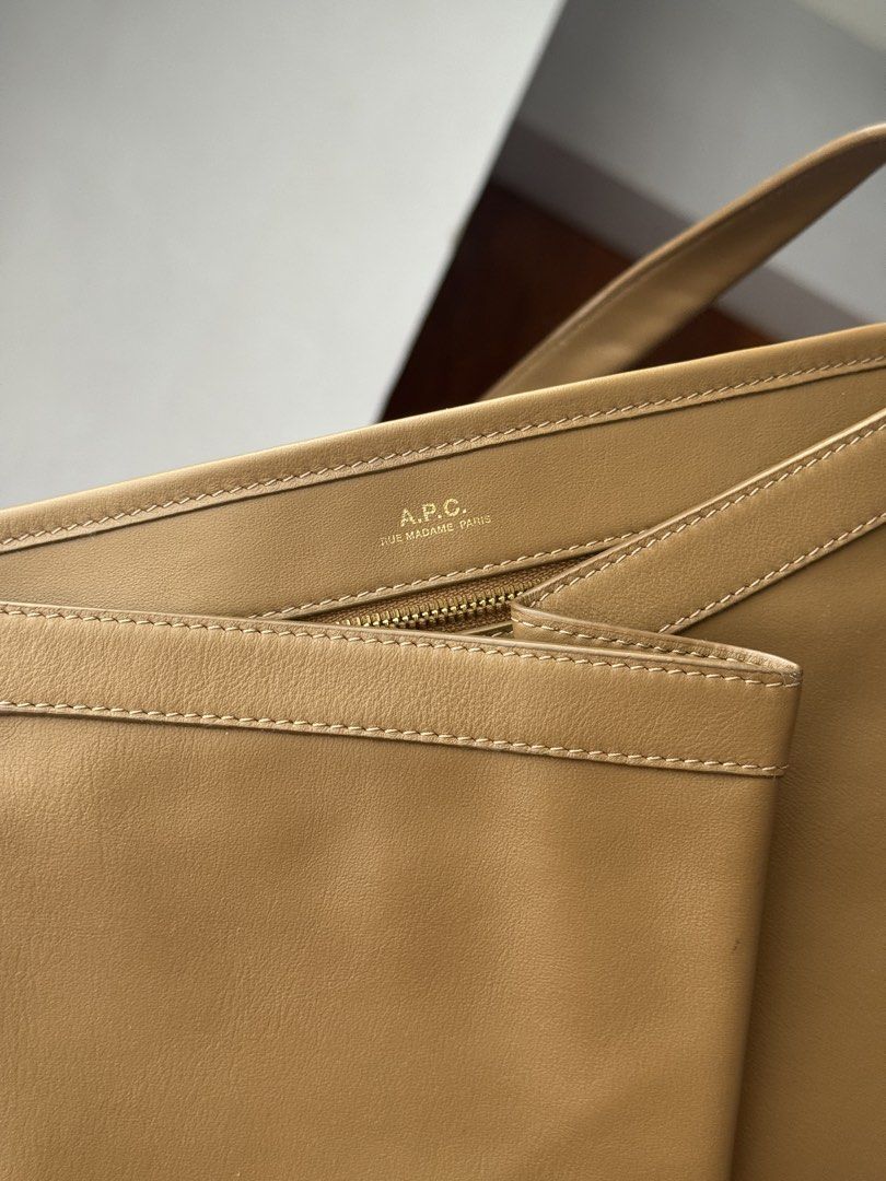 A.P.C. Ada Baguette Bag Tan Leather (Category: Shoulder Bags) located in Manila. Submitted by selenejuli94730 (Listing ID 1463620239, Image 3). Description: - Authentic A.P.C. shoulder bag - Color: Tan - Material: Genuine Leather - Interior: 1 zip pocket, 1 slip pocket - Comes with original tags - Ideal for everyday wear - Bought in Japan - Barely used.