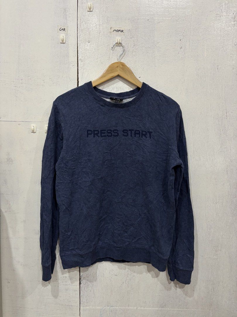 A.P.C. Blue Press Start Crewneck Sweatshirt (Category: Coats, Jackets and Outerwear) located in Manila. Submitted by noribrahim.20 (Listing ID 1463682896, Image 2). Description: - Brand: A.P.C. - Type: Crewneck Sweatshirt - Color: Blue - Size: L - Material: 100% Cotton - Features: Long sleeves, ribbed cuffs and hem, 'PRESS START' text print on chest - Style: Casual wear.