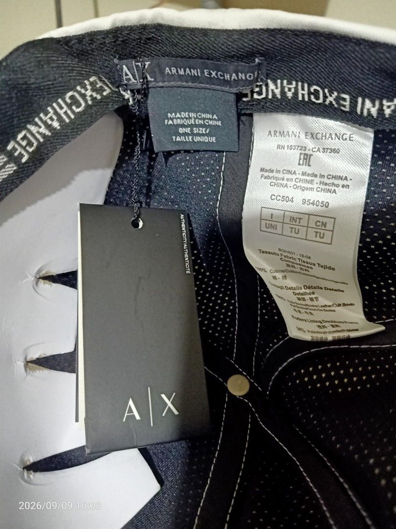 Armani Exchange AX White Cap/ Hat (Category: Caps & Hats) located in Las Pinas. Submitted by OmengSoyT (Listing ID 1463647062, Image 3). Description: -Authentic White Armani Exchange cap - Features the iconic AX logo on the front - Adjustable strap at the back for a customized fit - Comes with original hang and washed tags attached - Ideal for adding a stylish touch to casual outfit - One size fits all.