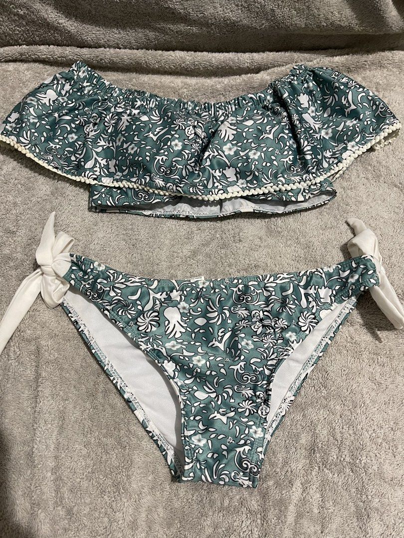 Assorted Bikini Sets - Various Styles and Colors (Category: Bikinis & Swimsuits) located in Manila. Submitted by miss.arpee (Listing ID 1463688117, Image 1). Description: - Collection of bikini sets available. - Styles include: green floral off-shoulder, rust one-shoulder, khaki knotted, and black ruffled. - All are two-piece sets. - Ideal for beach trips and pool days. - Please check photos for specific details on each bikini. 📌condition: 9/10 