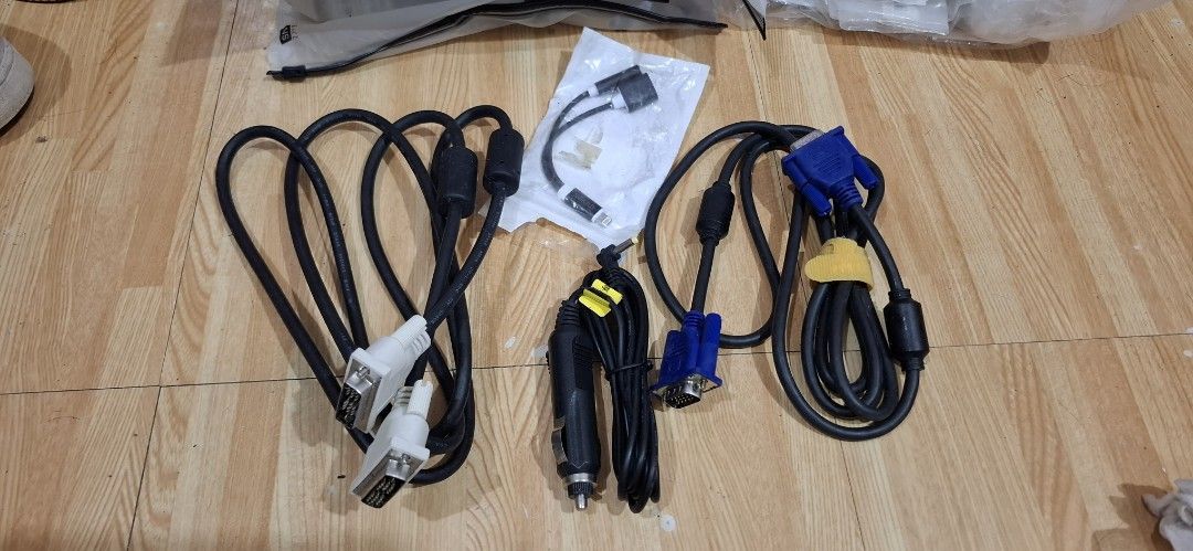 Assorted Computer Cables and Adapters (Bundle) (Category: Cables & Adaptors) located in Rizal. Submitted by apparelit115185 (Listing ID 1463628776, Image 1). Description: - Bundle includes various computer cables and adapters. - All cables are black. - Items included: VGA cables, car charger adapter, USB to Lightning adapter and DVI cable. - Ideal for connecting monitors or charging devices. - Perfect for use at home or on the go. - Bundle includ