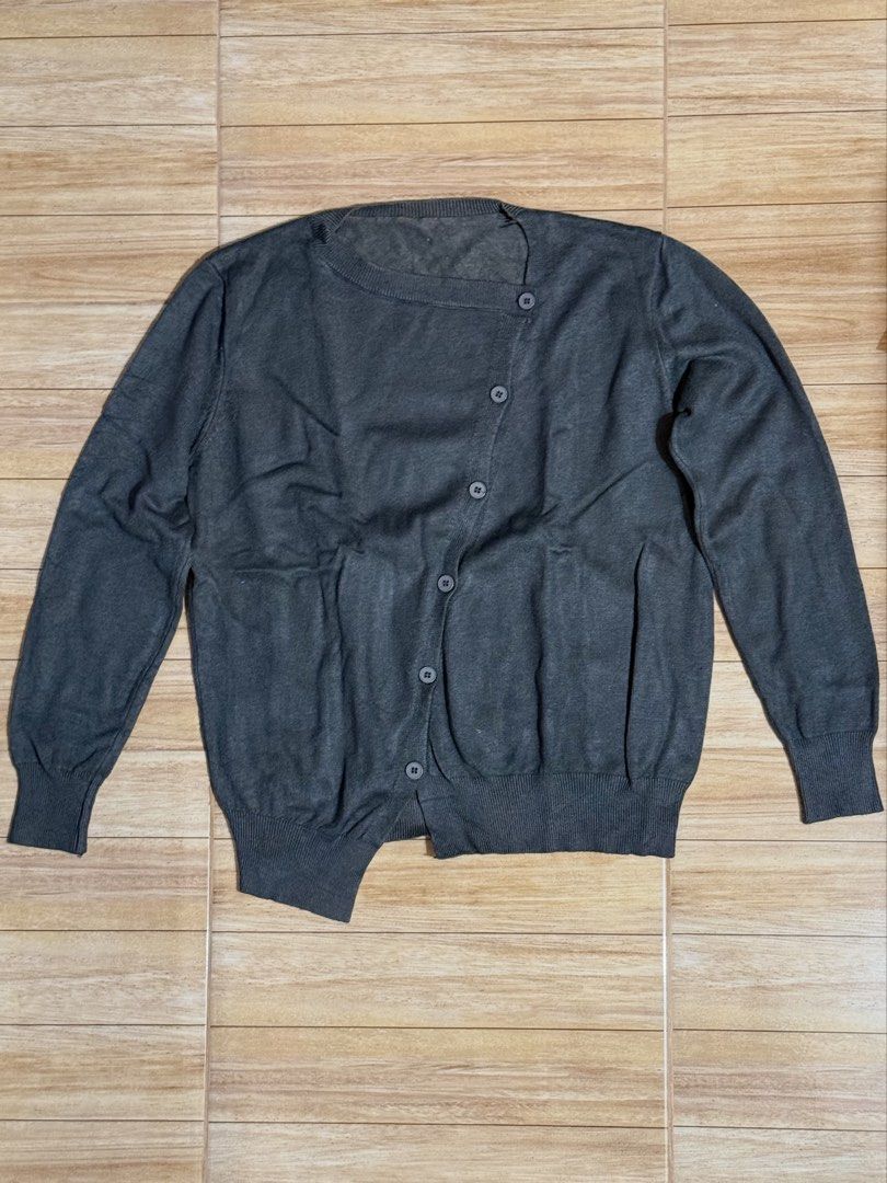 asymmetrical button knit cardigan (Category: Longsleeves) located in Binan City. Submitted by nakednini (Listing ID 1463711839, Image 1). Description: ⋆ warm knit fabric ⋆ 2-way style ⋆ has ribbed cuffs and hem ⋆ for cold weather dm me if you'd like more details 💌.