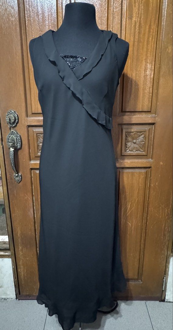 Atmosphere Black Sleeveless Midi Dress (Category: Dresses) located in Manila. Submitted by prelovedshopmnl (Listing ID 1463635917, Image 1). Description: - Black sleeveless midi dress by Atmosphere - Features a ruffled neckline - Sequined detail at the bust - Ruffled hemline - Ideal for parties or a night out - Size 16 on tag but fits Medium frame.