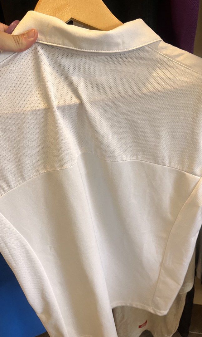 Authentic Adidas Men's Performance Polo Shirt – White (Category: Activewear) located in Dinalupihan. Submitted by banditvaultco (Listing ID 1463606668, Image 3). Description: Brand: Adidas Original / Performance Color: Pure White with black heat-transfer logo Size: Medium Excellent Condition Features:Lightweight, breathable, and moisture-wicking fabric—perfect for sports, golf, tennis, or everyday casual wear. Back features a cooling mesh panel c