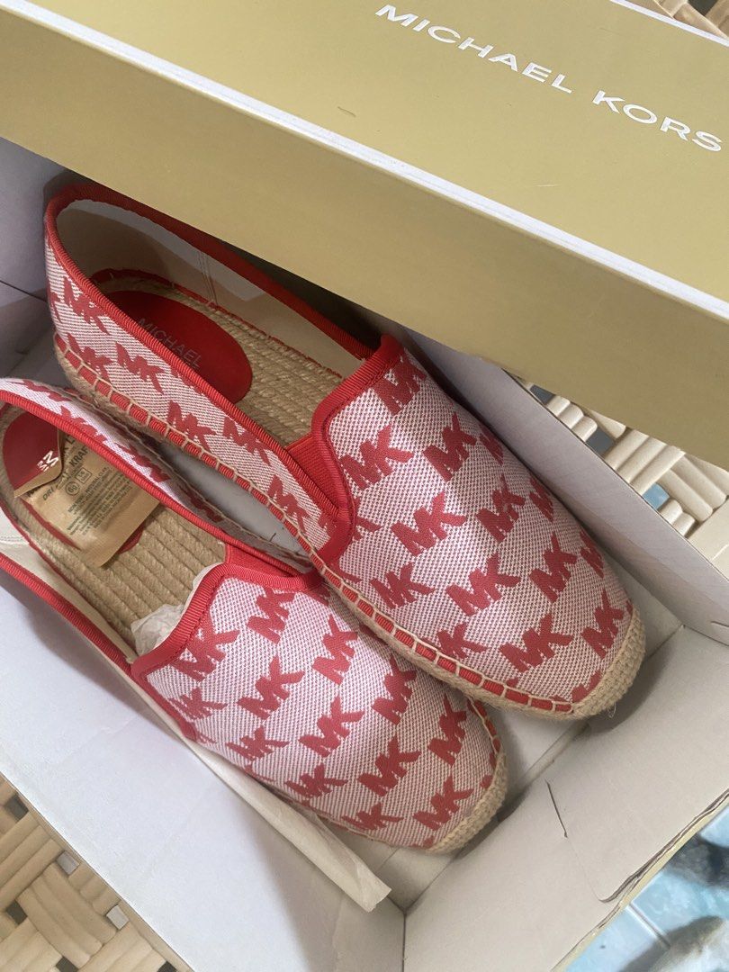 authentic Michael Kors Sandals (Category: Flats & Sandals) located in Naga. Submitted by sam.23_ (Listing ID 1463605335, Image 2). Description: - Authentic Michael Kors espadrilles - never been used - Classic red and white MK logo pattern - Includes original box.