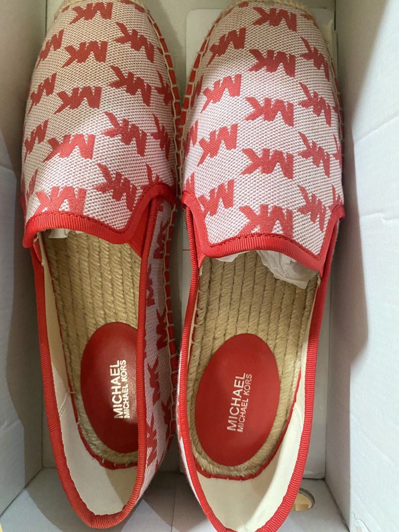 authentic Michael Kors Sandals (Category: Flats & Sandals) located in Naga. Submitted by sam.23_ (Listing ID 1463605335, Image 1). Description: - Authentic Michael Kors espadrilles - never been used - Classic red and white MK logo pattern - Includes original box.