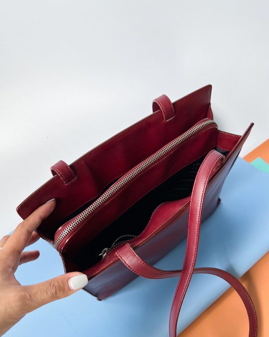Authentic Preloved Prada Vintage Bordeaux long shoulder bag (Category: Luxury Bags & Wallets) located in San Pablo. Submitted by misskittyph (Listing ID 1463583882, Image 3). Description: Prada Bordeaux Burgundy Medium Leather Long Shoulder Bag ▪️21500 only 8.5/10 condition Tolerable corner rubs Dimension is L27 x H24 x W9 (cm) generic dustbag Layaway options available 💯Guaranteed authentic or your money back ‼️NO IG DMs pls ‼️ Contact details i