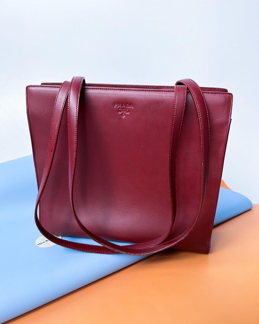 Authentic Preloved Prada Vintage Bordeaux long shoulder bag (Category: Luxury Bags & Wallets) located in San Pablo. Submitted by misskittyph (Listing ID 1463583882, Image 1). Description: Prada Bordeaux Burgundy Medium Leather Long Shoulder Bag ▪️21500 only 8.5/10 condition Tolerable corner rubs Dimension is L27 x H24 x W9 (cm) generic dustbag Layaway options available 💯Guaranteed authentic or your money back ‼️NO IG DMs pls ‼️ Contact details i