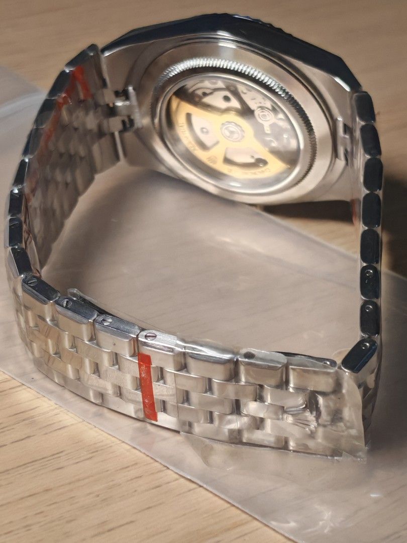 Automatic Watch (Category: Men's Watches) located in Singapore. Submitted by jerl33 (Listing ID 1463439503, Image 9). Description: Automatic watch mid grade with japanese miyota citizens 8215 Movement. stable and reliable. minor manufacturing defect. UP $300. fast deal $200..