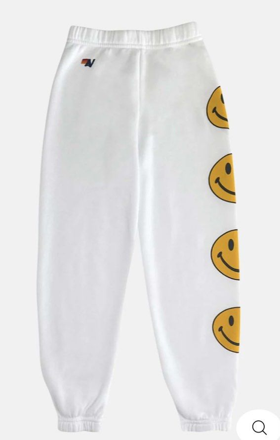 Aviator Nation White Smiley Face Sweatpants (Category: Joggers) located in Baguio. Submitted by workwear2600 (Listing ID 1463706917, Image 1). Description: - White Aviator Nation sweatpants - Fun smiley face detail down the side - Elastic waistband and cuffs for a comfortable fit - Super soft and cozy - Ideal for lounging or everyday casual wear -teens size fit 12 -like xs- small on adult -offer your price.