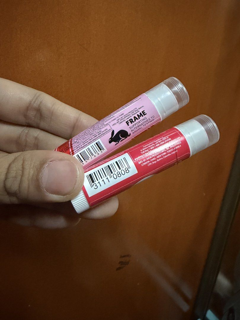 Avon Simply Pretty Strawberry & Cherry Lip Balms (Category: Makeup) located in Pasig City. Submitted by aprilluxcloset0812 (Listing ID 1463710155, Image 3). Description: - Two Avon Simply Pretty Lip Balms included for 200 - One Strawberry Moisturizing Lip Balm (Holiday Flavors). - One Cherry Flavor Savers Lip Balm. - Both are convenient twist-up sticks. - Keep your lips hydrated and add a touch of flavor. - Perfect for everyday use. RFS: declutte