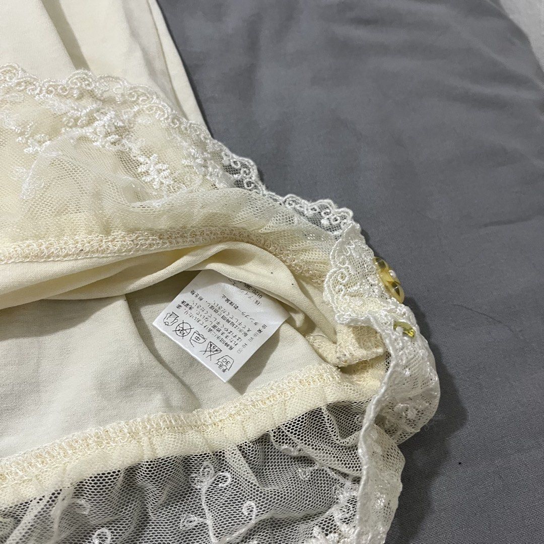 AXES FEMME (Category: Blouses) located in Pasig City. Submitted by xoxoyours (Listing ID 1463710630, Image 3). Description: -missing rhinestones (2nd slide).