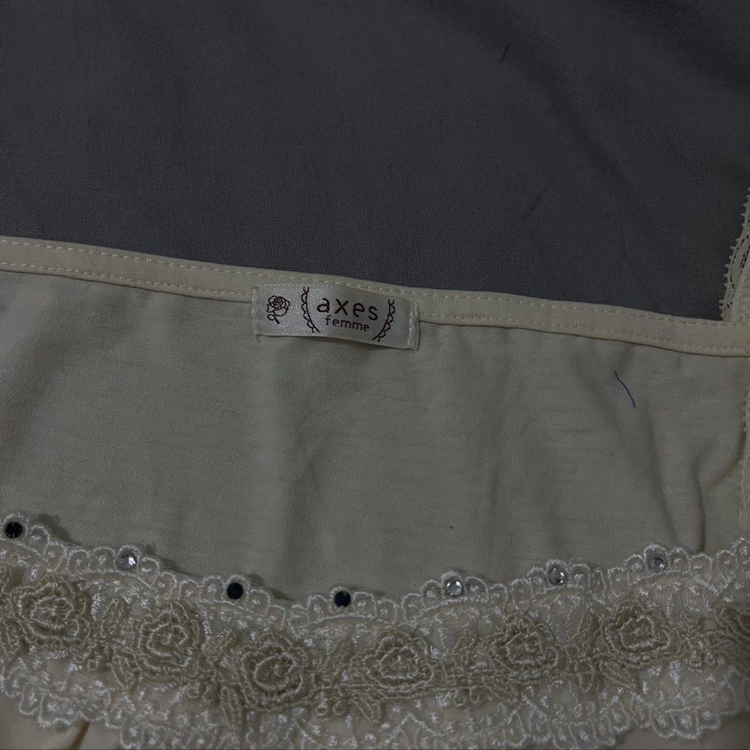 AXES FEMME (Category: Blouses) located in Pasig City. Submitted by xoxoyours (Listing ID 1463710630, Image 2). Description: -missing rhinestones (2nd slide).