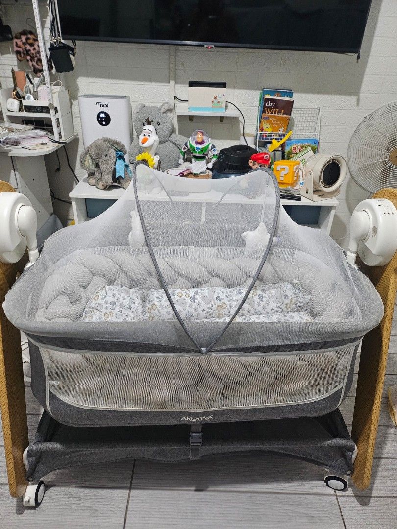 Baby Nest Bed with Mosquito Net (Category: Cots & Cribs) located in Cavite. Submitted by great_stuffsph (Listing ID 1463603531, Image 1). Description: Selling Akeeva swinging bassinet.-7500 Free Basinet foam(bought separately. comforter set with free braid bumper- 950 PM for interested - Portable baby nest bed for comfortable naps and travel. - Comes with a detachable mosquito net to protect your baby. - Padded sides ensure a safe and cozy enviro