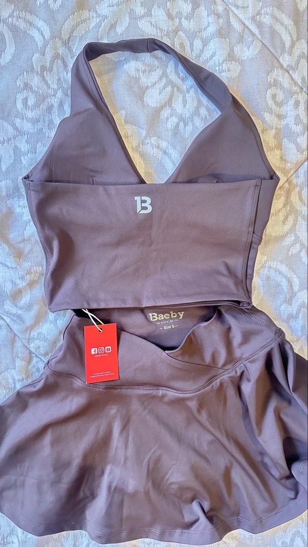Baeby Pickleball Set - Halter Crop Top & Skort (Category: Activewear) located in Jagna. Submitted by gemts777 (Listing ID 1463590169, Image 3). Description: - Adorable mocha brown activewear set - Includes halter neck crop top and matching skort - Perfect for workouts or casual wear - Size: Small (S) - Brand new with tags still attached.
