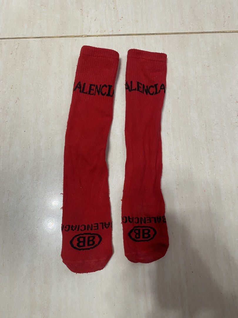 Balenciaga Red Socks with BB Logo (Category: Socks) located in Alburquerque. Submitted by zanegavynn43872 (Listing ID 1463739489, Image 1). Description: - Authentic Balenciaga red socks - Features the iconic BB logo at the ankle - Comfortable and stylish for everyday wear - Sold as a pair.
